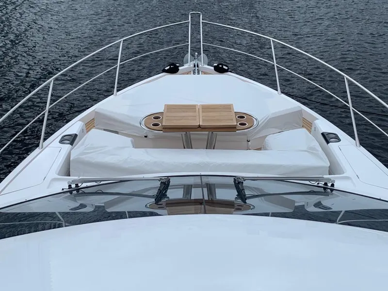 Slide: The Image of Sunseeker Manhattan 68 yacht bow with seating and table, 2020 model. - 35