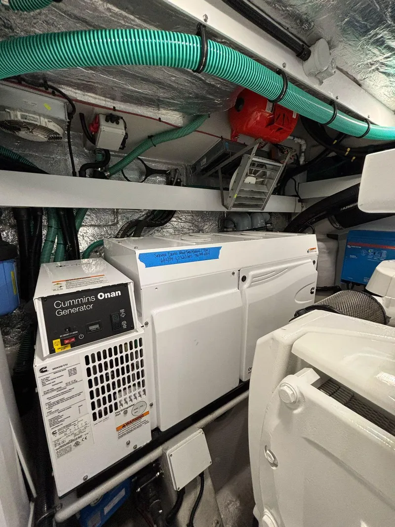 Slide: The Image of Engine room of 2020 Sunseeker Manhattan 68 yacht with Cummins Onan generator. - 40