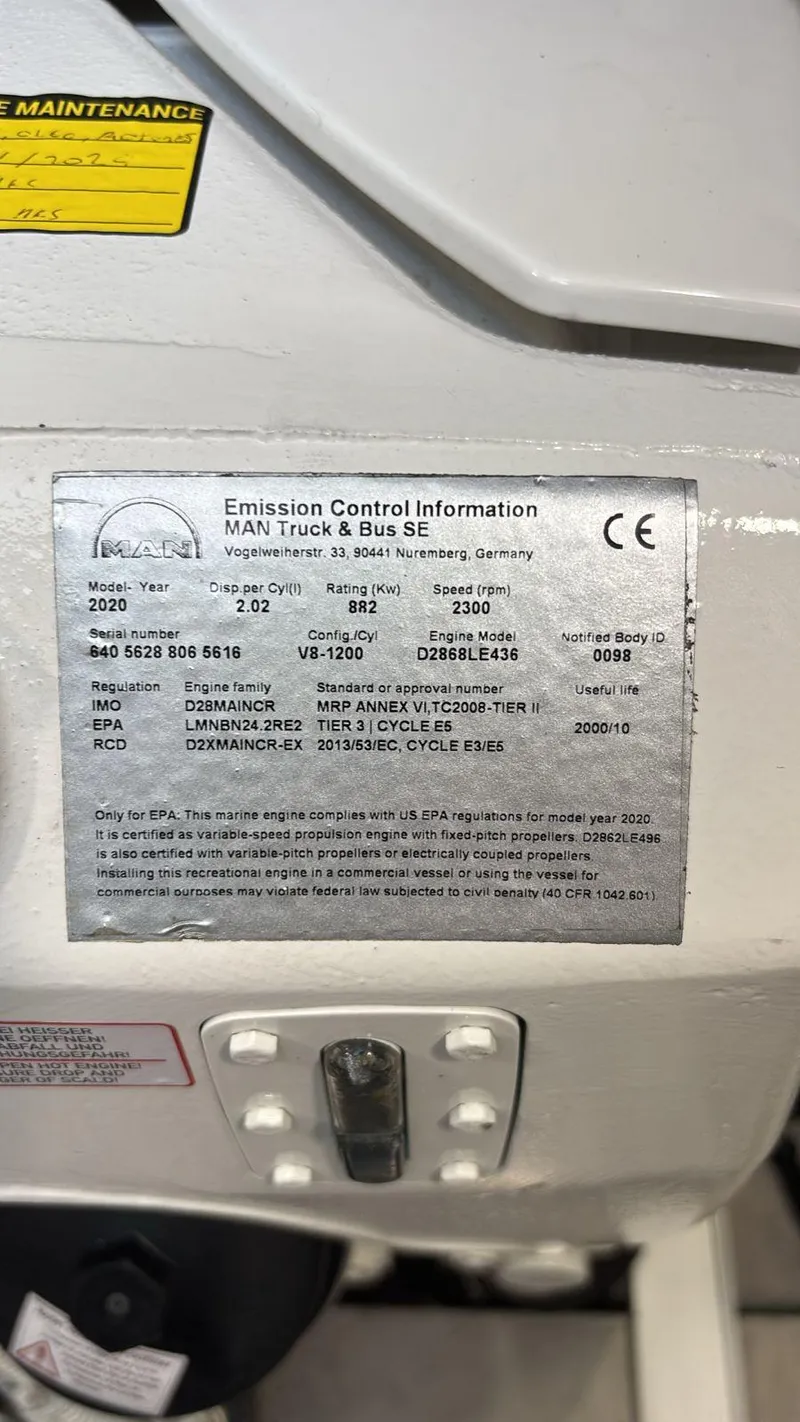 Slide: The Image of Emission control information label on a 2020 Sunseeker Manhattan 68 yacht engine. - 43