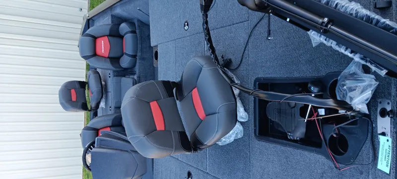 Slide: The Image of 2025 Tracker Pro Team 195 Tournament Edition boat interior with seating and equipment. - 4