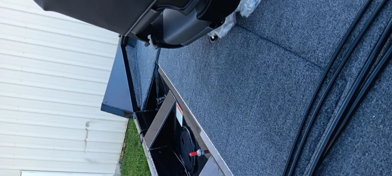 Slide: The Image of 2025 Tracker Pro Team 195 Tournament Edition boat interior with seating and storage compartments. - 6