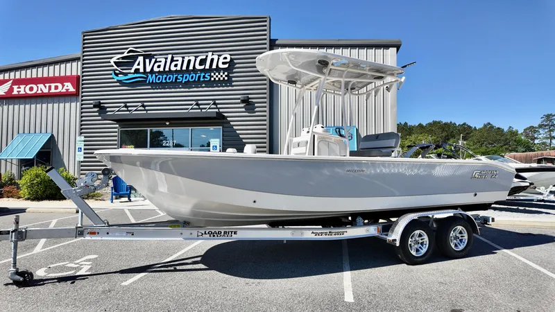 The Image of 2025 Carolina Skiff 24 Ultra Elite boat on trailer at Avalanche Motorsports dealership. - 0