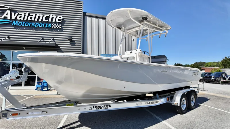 Slide: The Image of 2025 Carolina Skiff 24 Ultra Elite boat on trailer at Avalanche Motorsports. - 5