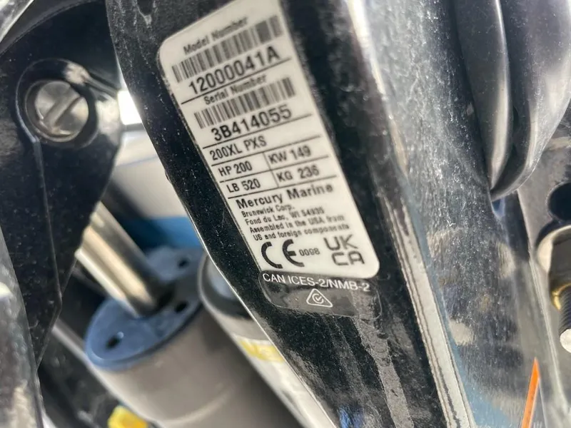 Slide: The Image of Label on Mercury Marine engine, showing specifications and compliance details. - 12