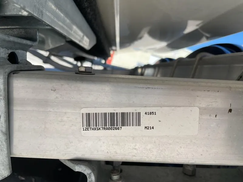 Slide: The Image of Barcode and serial number on a 2025 Mako 214 Center Console boat component. - 14