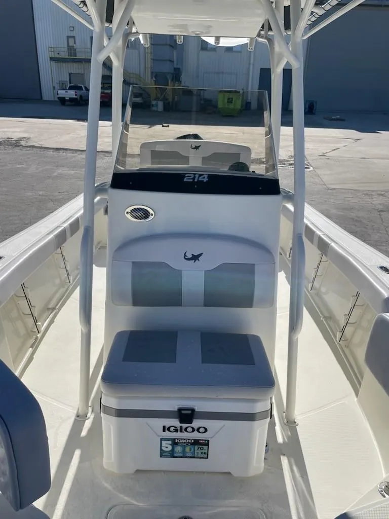 Slide: The Image of 2025 Mako 214 Center Console boat with Igloo cooler on deck. - 5