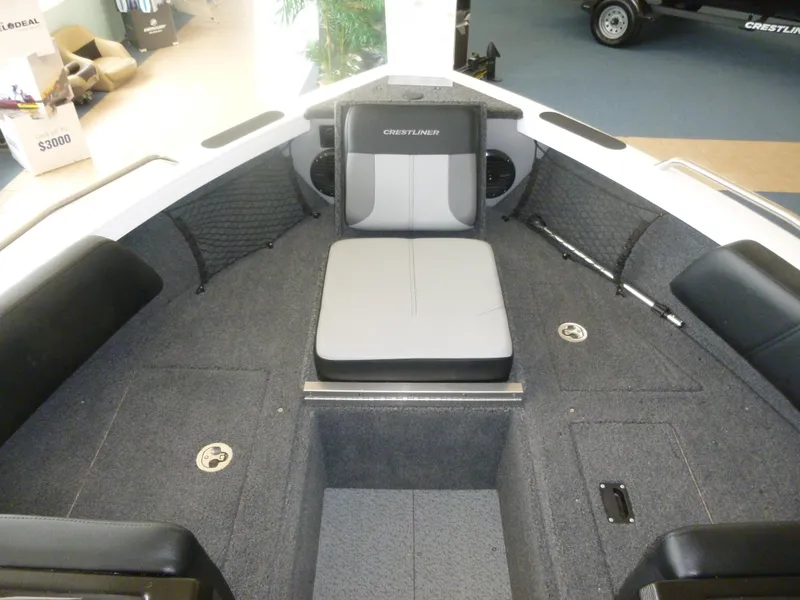 Slide: The Image of 2024 Crestliner 1850 SPORT FISH boat interior with seating and storage compartments. - 4