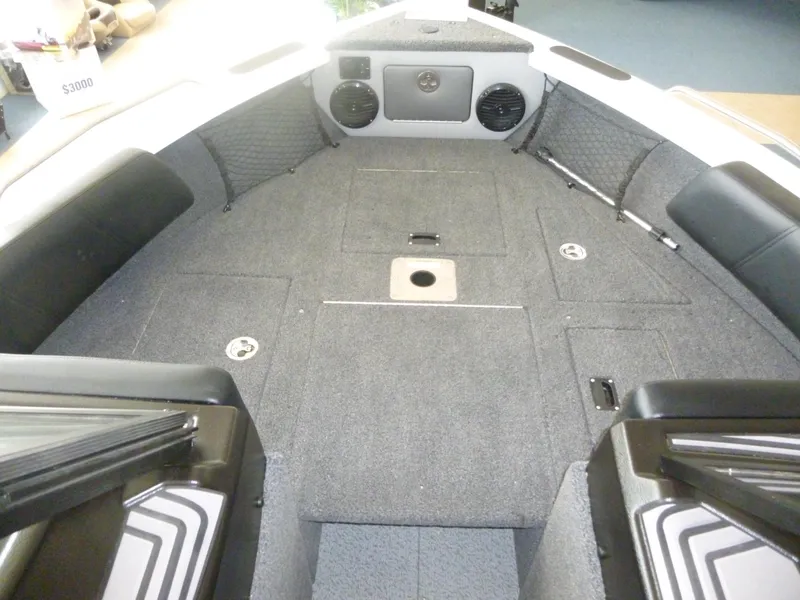 Slide: The Image of 2024 Crestliner 1850 SPORT FISH boat interior with spacious deck and storage compartments. - 5