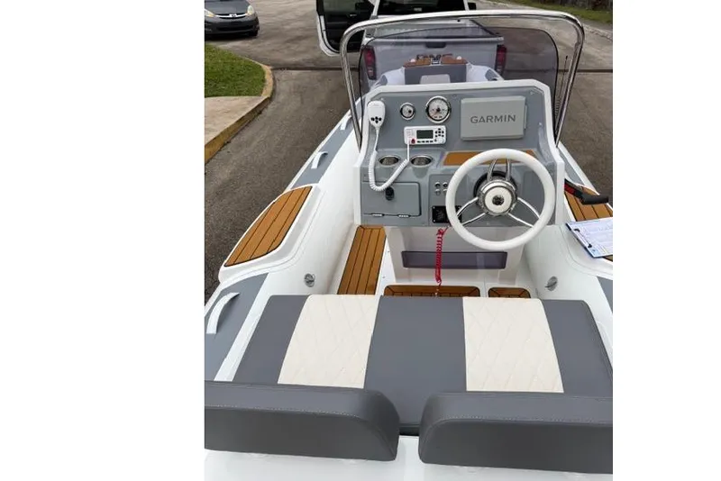 Slide: The Image of 2026 Gala V420 boat interior with Garmin dashboard. - 6