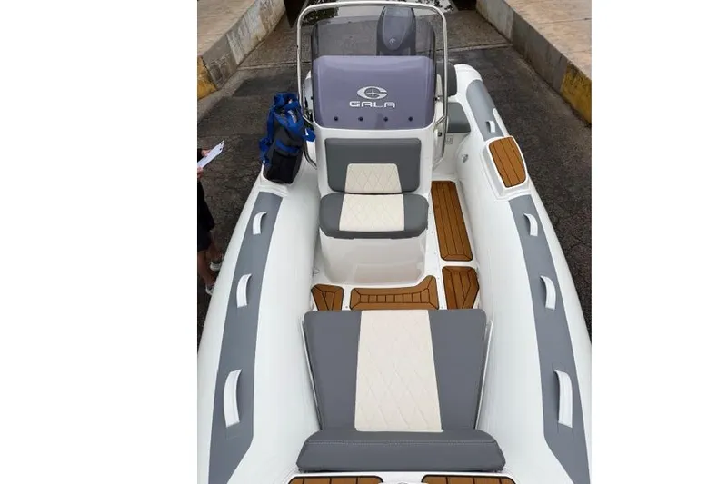Slide: The Image of Gala V420 boat 2026 with gray and white seating. - 9