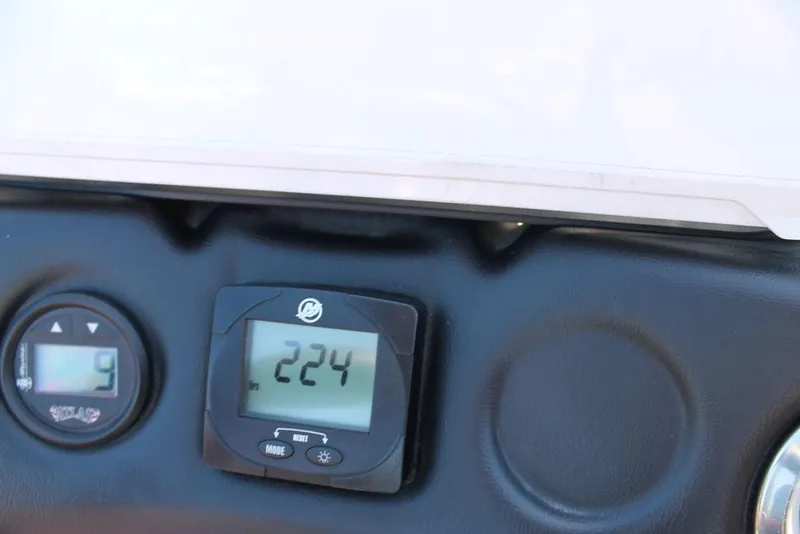 Slide: The Image of Dashboard of 2023 Phoenix 921 Elite II showing digital displays and controls. - 10