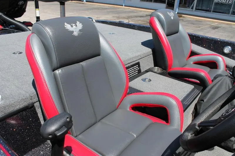 Slide: The Image of 2023 Phoenix 921 Elite II boat seats, gray and red leather, with embroidered logo. - 11