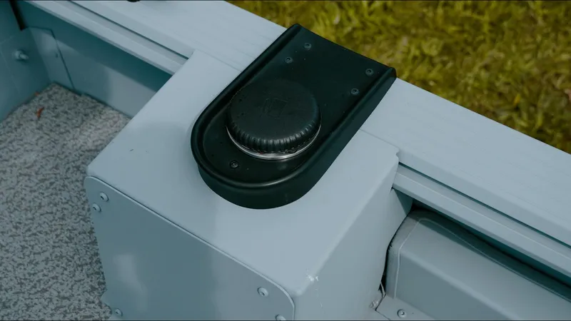 Slide: The Image of Control knob on 2025 G3 Guide V187 T boat, mounted on a gray surface. - 14