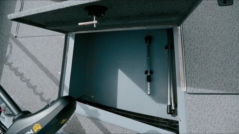 Slide: The Image of Open storage compartment in 2025 G3 Guide V187 T boat. - 15