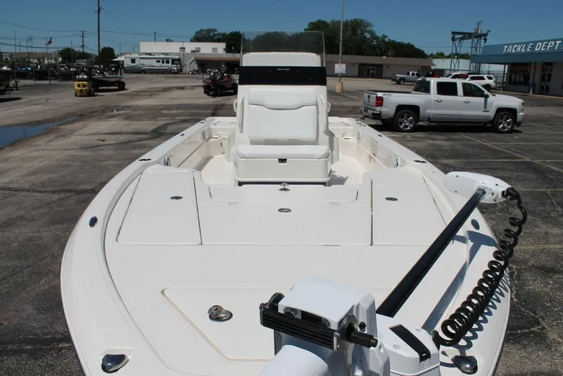 Slide: The Image of 2025 Skeeter SX241 boat in parking lot, featuring spacious deck and modern design. - 12