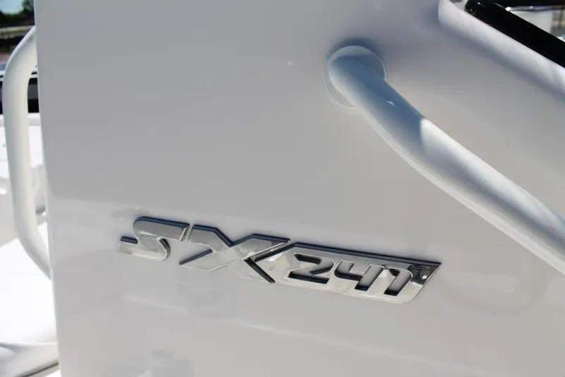 Slide: The Image of 2025 Skeeter SX241 boat emblem on white surface. - 3