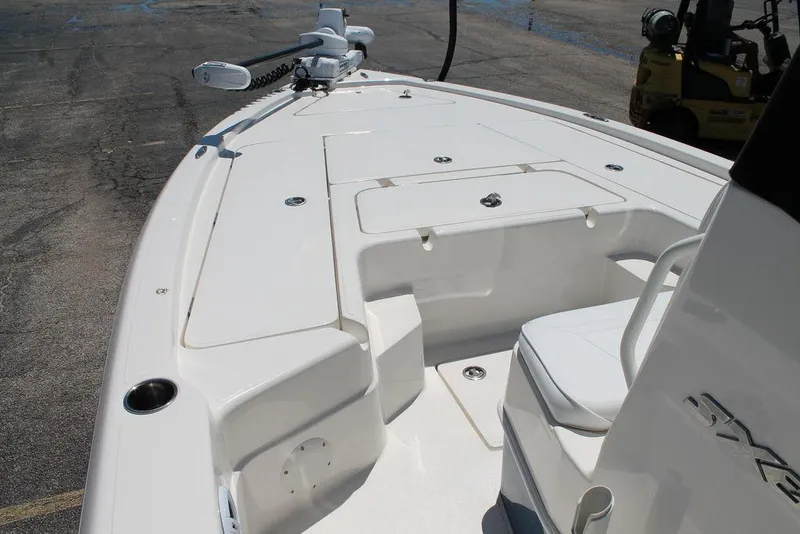 Slide: The Image of 2025 Skeeter SX241 boat deck with seating and storage compartments. - 6