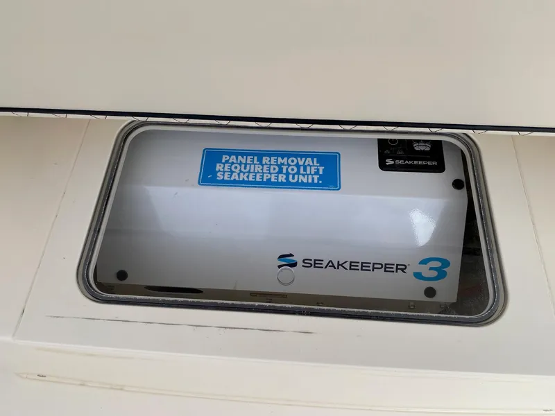 Slide: The Image of Seakeeper 3 unit in 2026 Scout 357 LXF boat, panel removal required. - 8