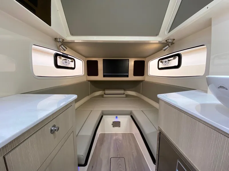 Slide: The Image of Luxurious interior of 2026 Scout 357 LXF boat with modern amenities and sleek design. - 9