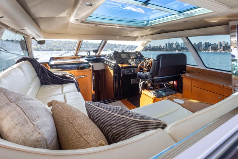 Slide: The Image of Luxurious 2005 Tiara Yachts 5200 Sovran Salon interior with plush seating and panoramic views. - 17