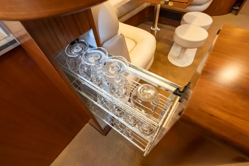 Slide: The Image of Pull-out glass rack in 2005 Tiara Yachts 5200 Sovran Salon interior. - 36
