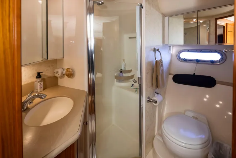 Slide: The Image of Luxurious bathroom in 2005 Tiara Yachts 5200 Sovran Salon with shower and toilet. - 38