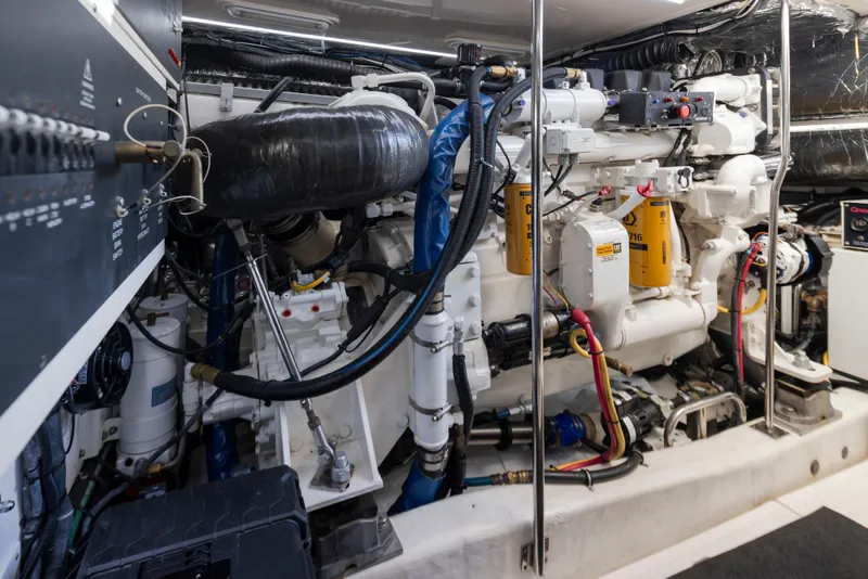 Slide: The Image of Engine room of 2005 Tiara Yachts 5200 Sovran Salon, showcasing complex machinery and components. - 40