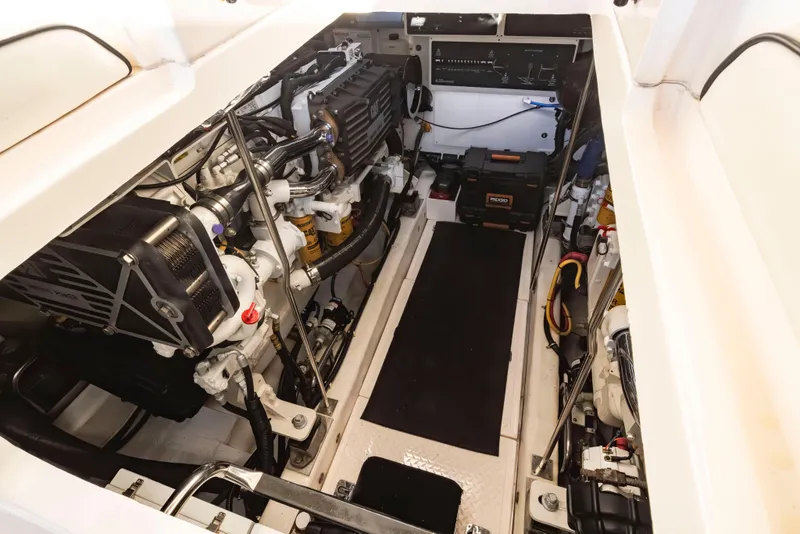 Slide: The Image of Engine room of 2005 Tiara Yachts 5200 Sovran Salon, showcasing mechanical components and layout. - 44