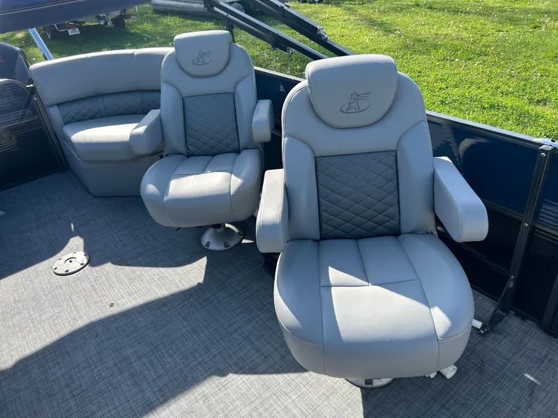 Slide: The Image of 2019 Misty Harbor Biscayne Bay 2285BR boat interior with plush gray seating. - 12