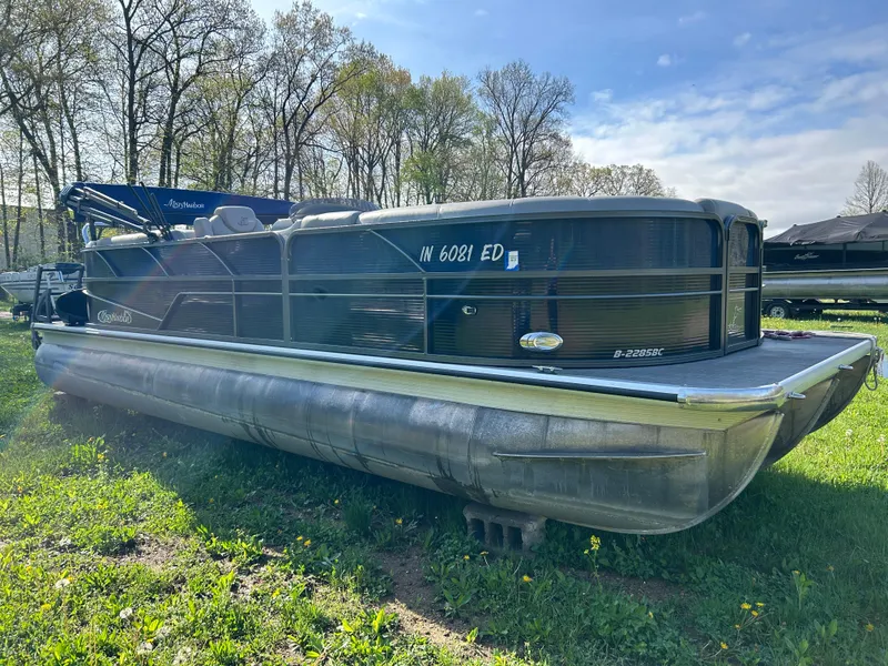 Slide: The Image of 2019 Misty Harbor Biscayne Bay 2285BR Triple Tube pontoon boat on grassy field. - 3