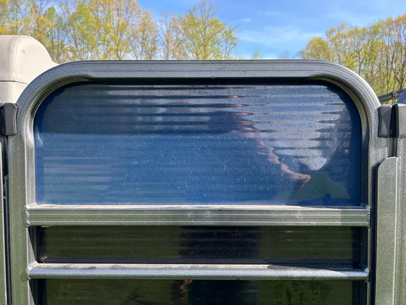 Slide: The Image of 2019 Misty Harbor Biscayne Bay 2285BR Triple Tube pontoon gate with scenic background. - 7