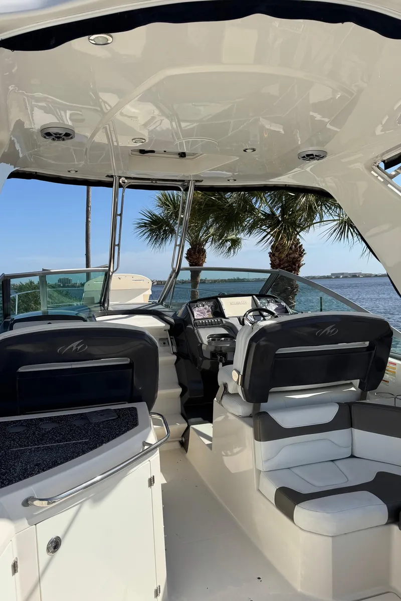 Slide: The Image of Interior view of a 2013 Monterey 320 Sport Yacht with ocean backdrop. - 10