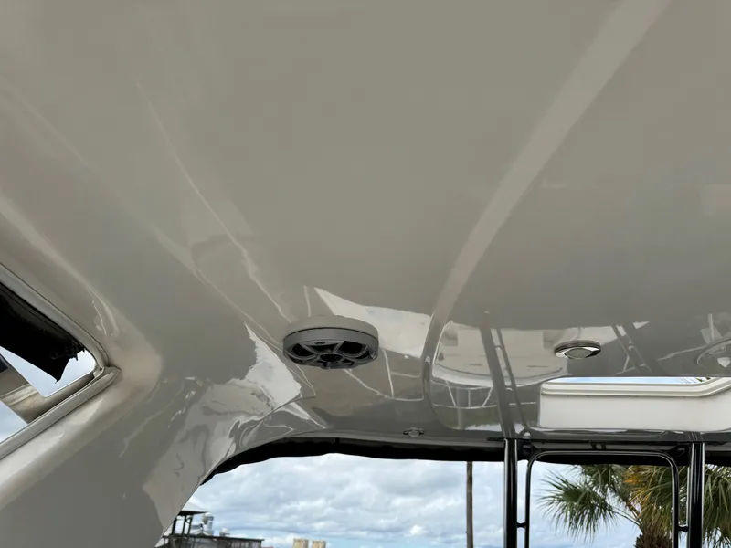 Slide: The Image of 2013 Monterey 320 Sport Yacht interior ceiling with speaker and lighting fixtures. - 22