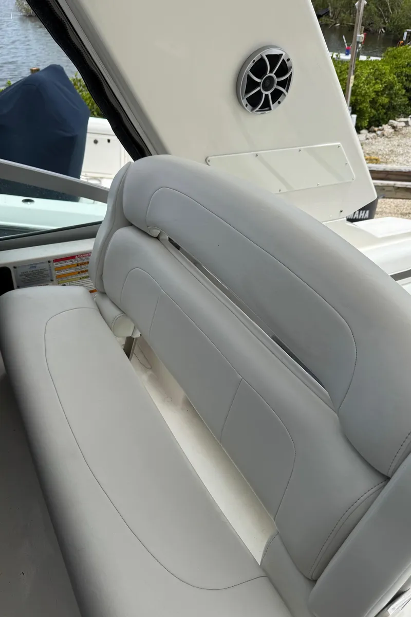Slide: The Image of 2013 Monterey 320 Sport Yacht interior seating with speaker detail. - 27