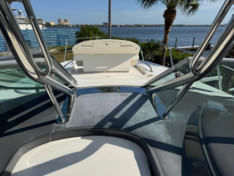Slide: The Image of 2013 Monterey 320 Sport Yacht deck view with waterfront background. - 30