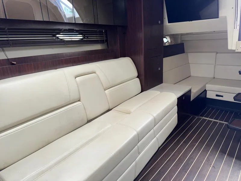Slide: The Image of Luxurious interior of 2013 Monterey 320 Sport Yacht with cream leather seating. - 43