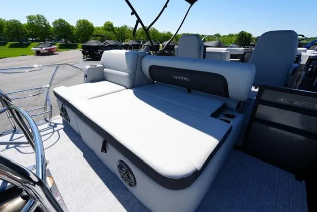 Slide: The Image of 2025 Harris Cruiser 210 boat interior with spacious seating and modern design. - 14