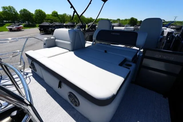 Slide: The Image of 2025 Harris Cruiser 210 boat with spacious seating and modern design. - 15