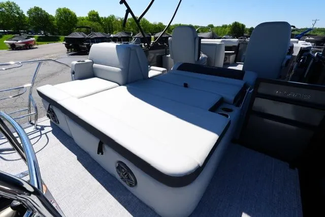 Slide: The Image of 2025 Harris Cruiser 210 boat interior with spacious seating and modern design. - 16