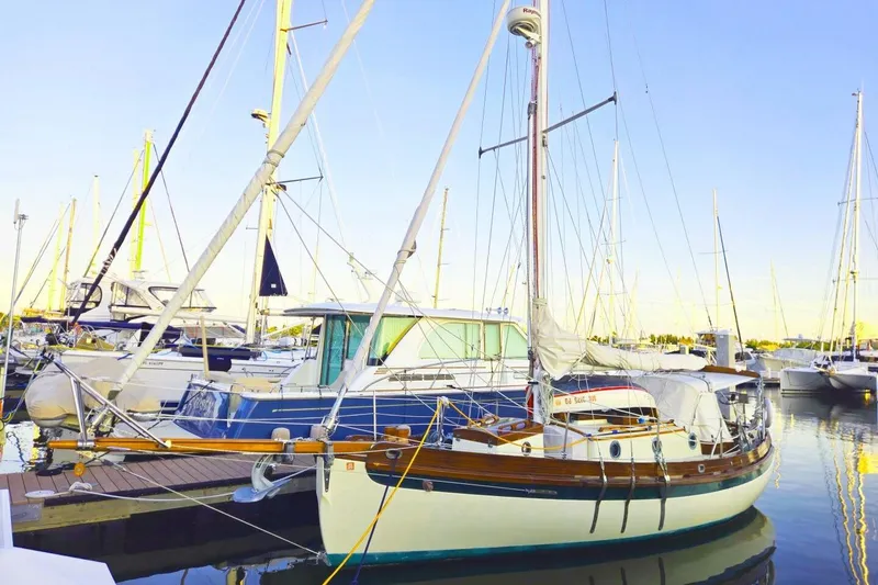 The Image of 1994 Bristol Channel Cutter Sam L Morse BCC 28 sailboat docked in marina. - 1