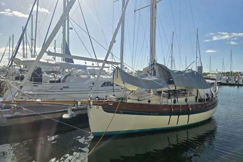 Slide: The Image of 1994 Bristol Channel Cutter Sam L Morse BCC 28 docked at marina under clear sky. - 4