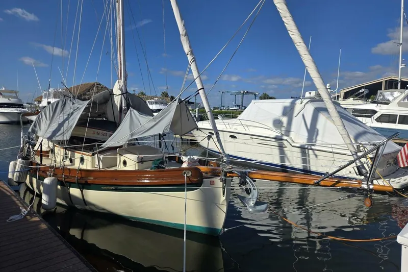 Slide: The Image of 1994 Bristol Channel Cutter Sam L Morse BCC 28 sailboat docked in marina. - 6