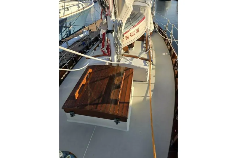 Slide: The Image of 1994 Bristol Channel Cutter Sam L Morse BCC 28 deck with wooden hatch and rigging. - 14