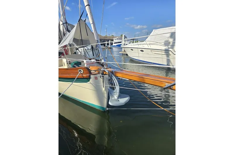 Slide: The Image of 1994 Bristol Channel Cutter Sam L Morse BCC 28 docked in a marina, sunny day. - 18