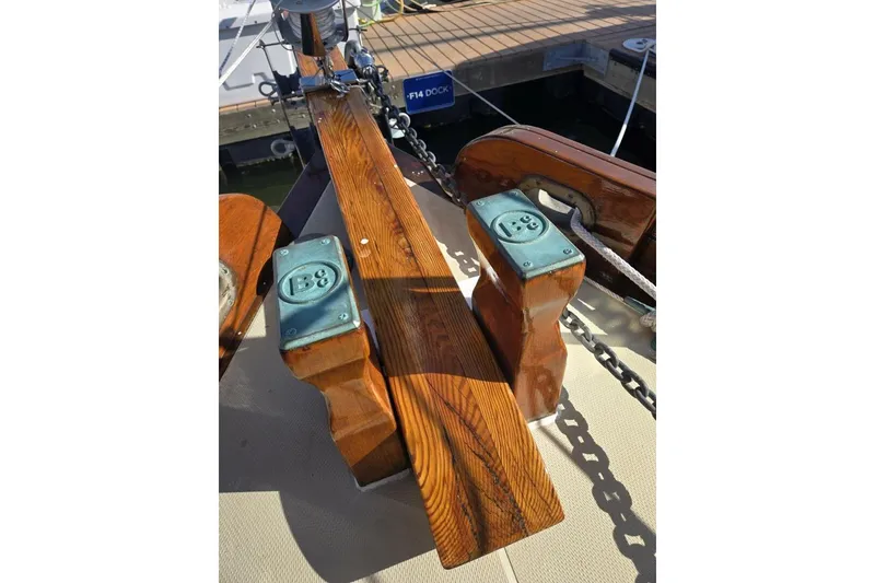 Slide: The Image of Bristol Channel Cutter 1994, Sam L Morse BCC 28, wooden deck details, docked at marina. - 19