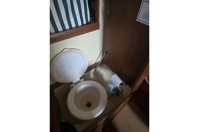 Slide: The Image of Toilet area in 1994 Bristol Channel Cutter Sam L Morse BCC 28 sailboat. - 27