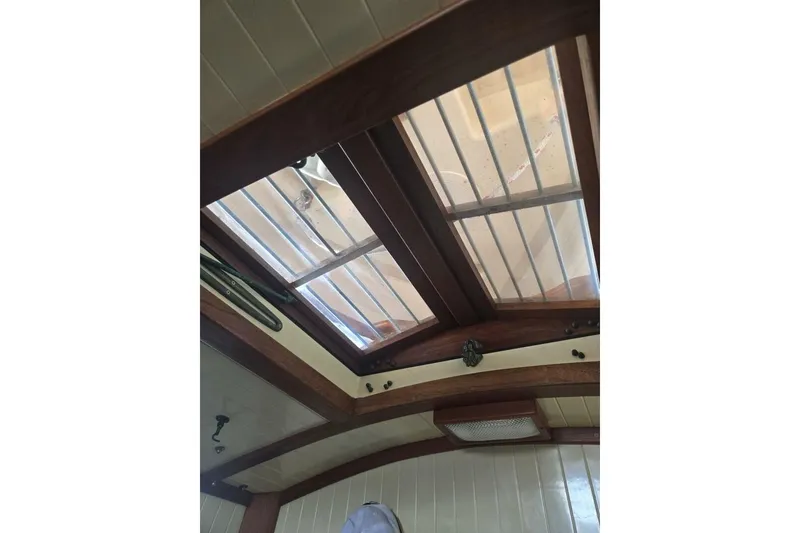 Slide: The Image of Interior view of 1994 Bristol Channel Cutter Sam L Morse BCC 28 cabin ceiling. - 28