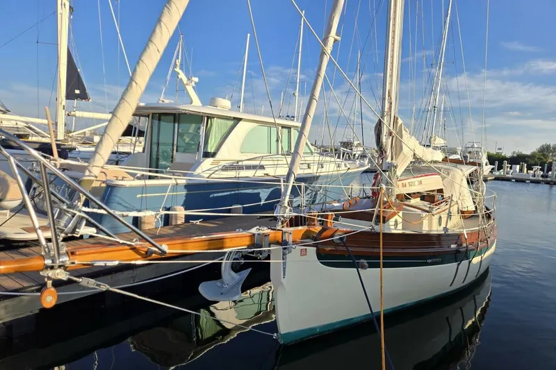 Slide: The Image of 1994 Bristol Channel Cutter Sam L Morse BCC 28 sailboat docked in marina. - 5
