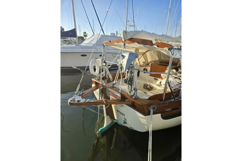 Slide: The Image of 1994 Bristol Channel Cutter Sam L Morse BCC 28 docked in marina, rear view. - 9