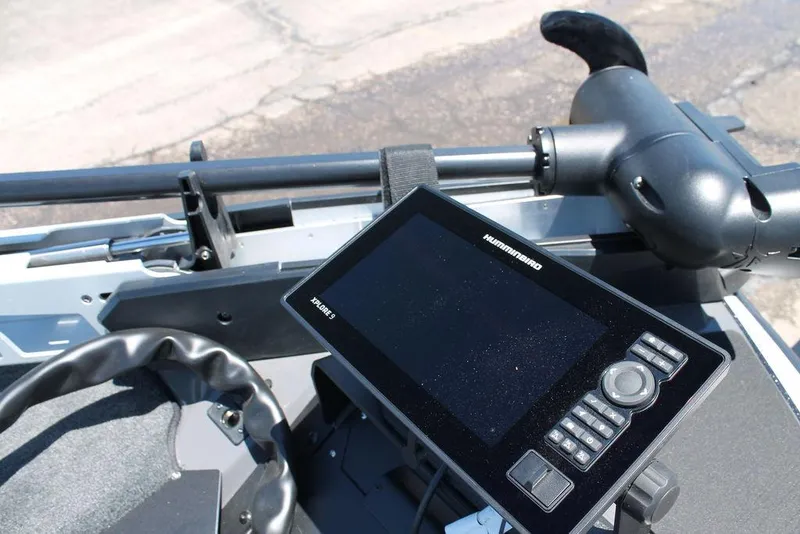 Slide: The Image of 2025 Skeeter ZXR21 boat dashboard with advanced navigation system and controls. - 2